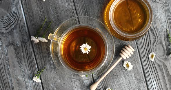 Herbal Tea and Jar of Honey