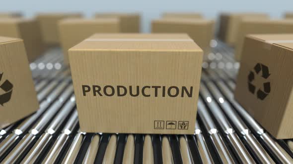 Carton Boxes with PRODUCTION Text Move on Roller Conveyor