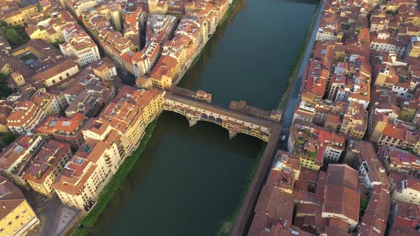 Aerial view of Ponte Vecchio crossing the Arno river, Florence, Italy.