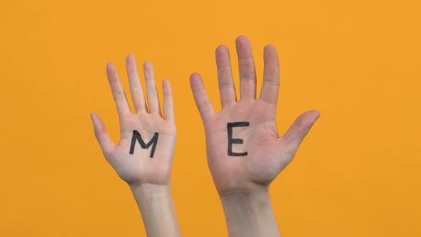 Eco Written on Palms, Children Raising Hands in Orange Background, Save Nature