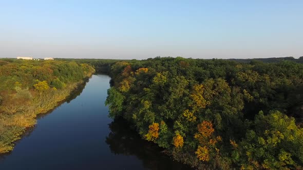 Flying Over the Mouth of a Narrow River. Nature Morning