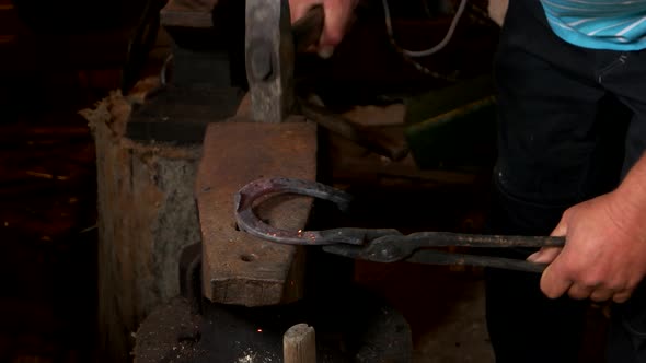 Close Up View Blacksmith Forging Horseshoe