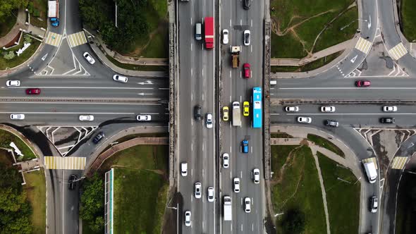 Top View of a City Intersection with Buses, Cars, Trucks. Traffic at Daytime, Roadcross in the