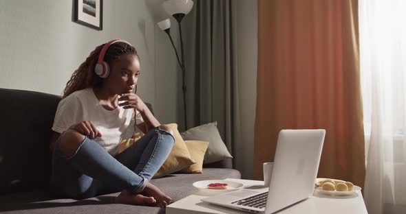 Nervous Black Woman Watching Film