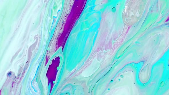 Abstract Psychedelic Background, Multicolored Paints Slowly Pour Into Patterns in Milk