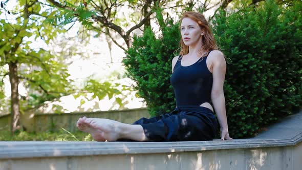 Woman Doing Bearhing Exercise Outdoors