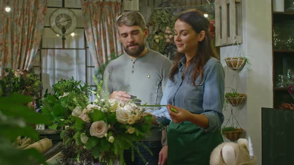 Floral Designer Making Stunning Bouquet for Client