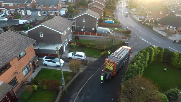 January 201, Aerial View, footage of Dustmen putting recycling waste into a garbage truck, Bin men,