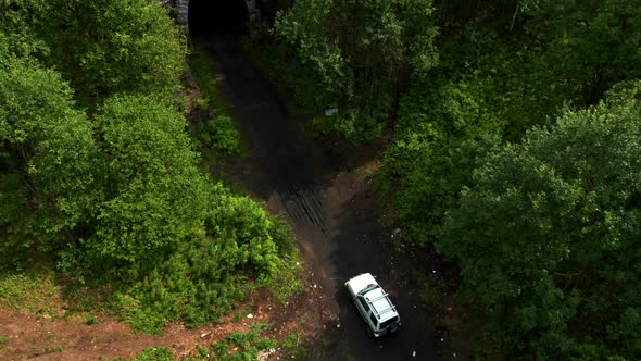 Aerial View of the Car Entering the Tunnel