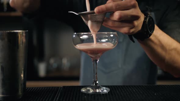 Young Professional Bartender Preparing Cocktails Outside Close Up Slow Motion Pouring Shaker