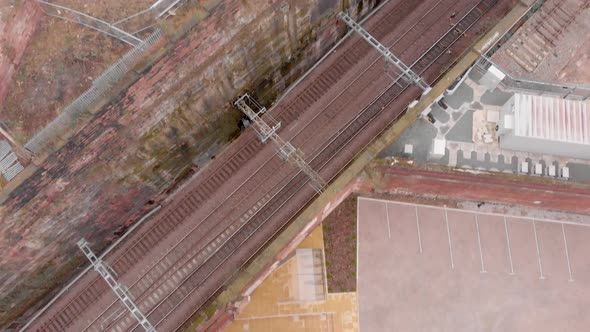 Drone shot Aerial Liverpool railway on national railway tracks train service birds eye view