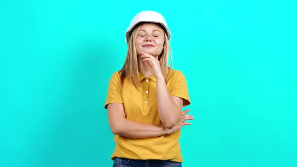 The Happy Young Engineer Smiles at the Camera