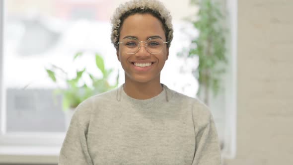 Portrait of Attractive African Woman Smiling at Camera