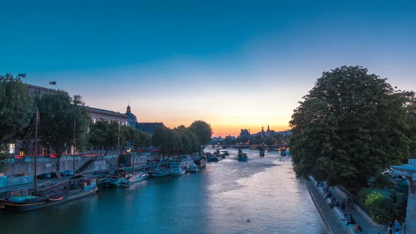 View on Pont Des Arts in Paris After Sunset Day to Night Timelapse France