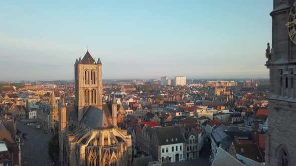 Drone Aerial Pull Back Reveal shot of Old Bell Tower. Aerial shot Het Belfort Van Gent, Ghent, Belgi