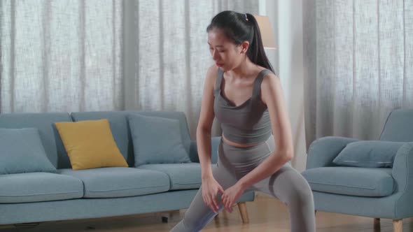 Asian Athletic Female Exercising, Stretching And Practicing Yoga At Home. Healthy Lifestyle, Fitness