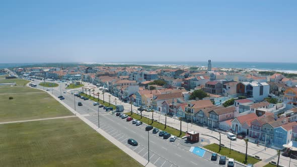 Aerial View of  Costa Nova Do Prado in Portugal, street with colorful and striped houses 4K