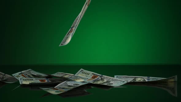 American $100 Bills Falling onto a Reflective Surface - MONEY PHANTOM 051