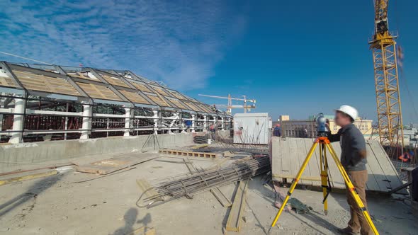 Construction Worker Using Theodolite Surveying Optical Instrument Timelapse