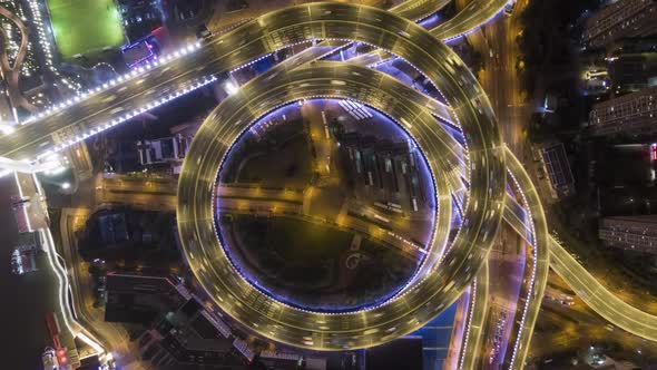 Illuminated Circular Nanpu Road Junction at Night. Traffic Circle. Shanghai, China. Aerial View