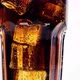 Bubbles of air rise up. Cola with ice in a glass beaker. - VideoHive Item for Sale