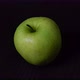 Green fresh apple scaling in the dark - VideoHive Item for Sale