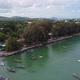 Fishing Boats at Anchor Along a Tropical Coastline Aerial - VideoHive Item for Sale