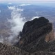 Misty Clouds Boil over Desert Peak - VideoHive Item for Sale
