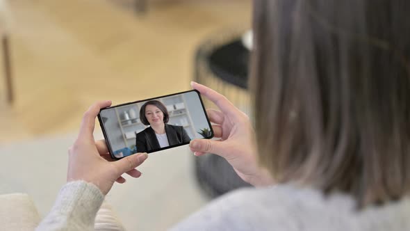 Talking Old Woman in Smartphone, Video Chatting 