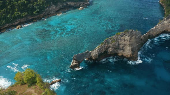 Aerial shot of beautiful rocks on the sea. Nusa Penida Island.