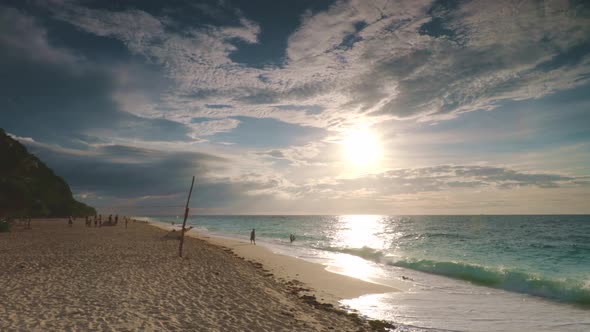 Sunrise Philippines Ocean Beach People Rest on Sand Water at Sea Coast Bay Sun Rise on Blue Sky