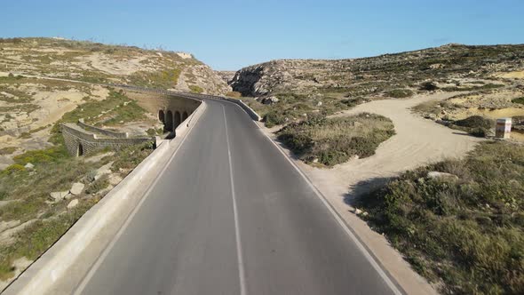 Aerial View of Road Across the Island Mountains