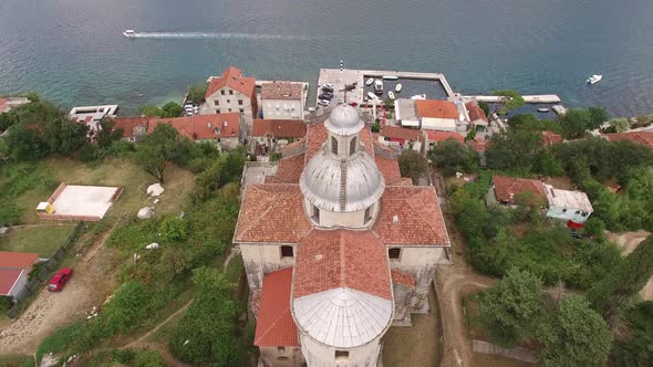 View of the Church of the Our Lady Birth in Prcanj on the Background of the Bay