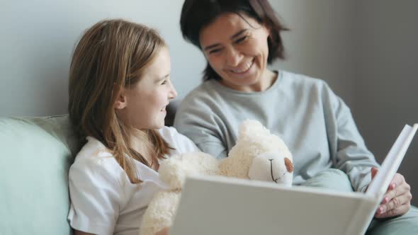 Mother and Daughter with Book