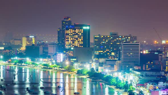 timelapse of Pattaya city and the many boats docking at night