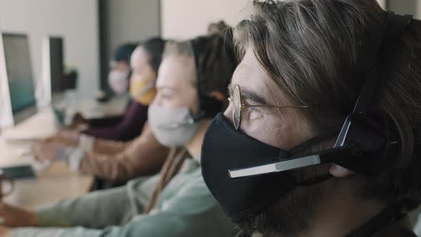 Man Working in Call Center during Pandemic