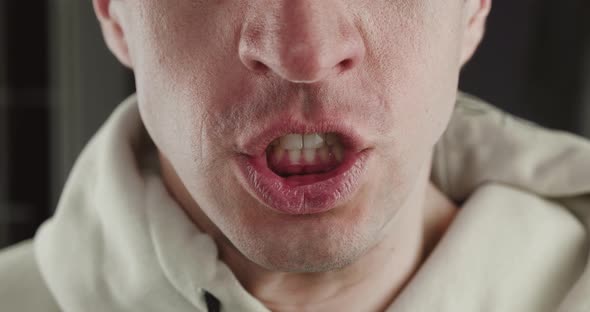 Closeup Mouth of Aggressive Man Screaming