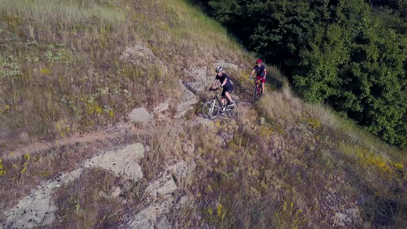 Men Riding a Bike