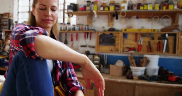 Portrait of attractive carpenter smiling for camera