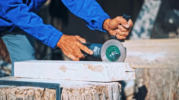 Industrial Worker at Factory on Granite Manufacture