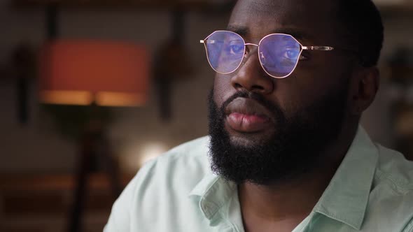 Bearded Man with Glasses Shopping Online on Laptop