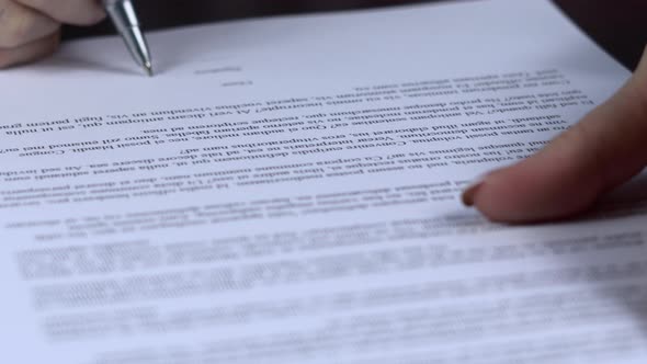 Business Woman hands Signing Contract on Business Office Desk