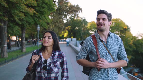 Young Mixed Race Tourist Couple Walking Through the City and Having Some Fun Slow Motion