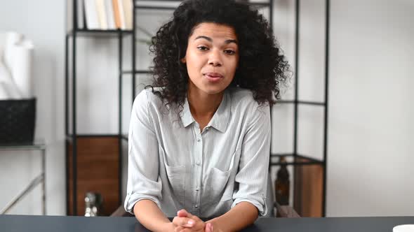 An AfricanAmerican Young Woman in the Modern Office Space