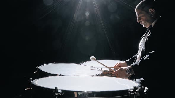 Musician Playing the Timpani