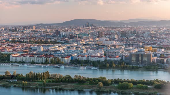 Aerial Panoramic View of Vienna City with Skyscrapers Historic Buildings and a Riverside Promenade