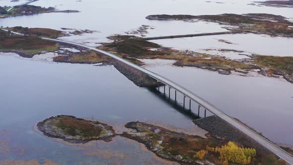 Aerial View Of Bridge At Atlantic Ocean Road Over Norwegian Sea With Island In Norway.