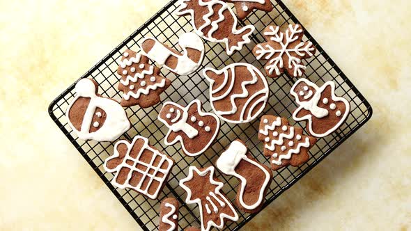 Fresh Baked Christmas Shaped Gingerbread Cookies Placed on Steel Grill