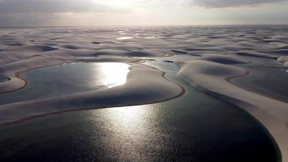 Sunset at Lencois Maranhenses Maranhao. Scenic sand dunes and rainwater lakes