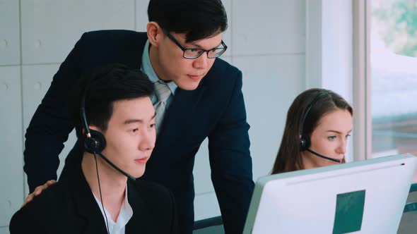 Business People Wearing Headset Working in Office